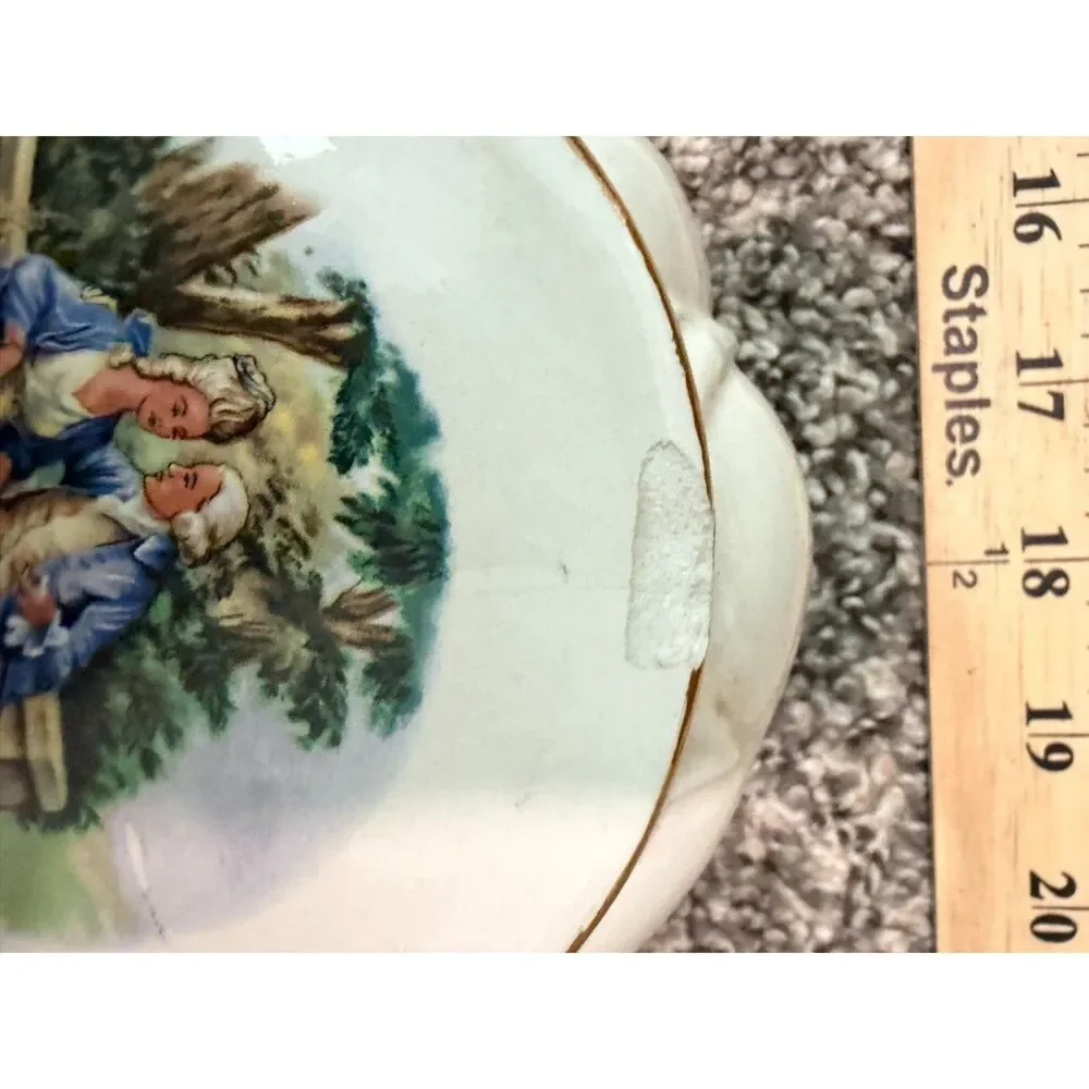 Vtg. Round Porcelain Trinket box with romantic couple scene